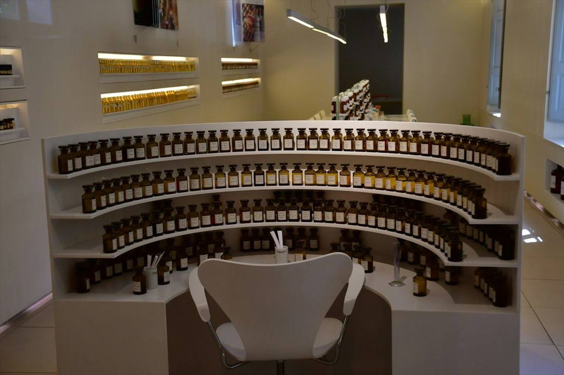 Perfumer's organ with rows of fragrance essence bottles
